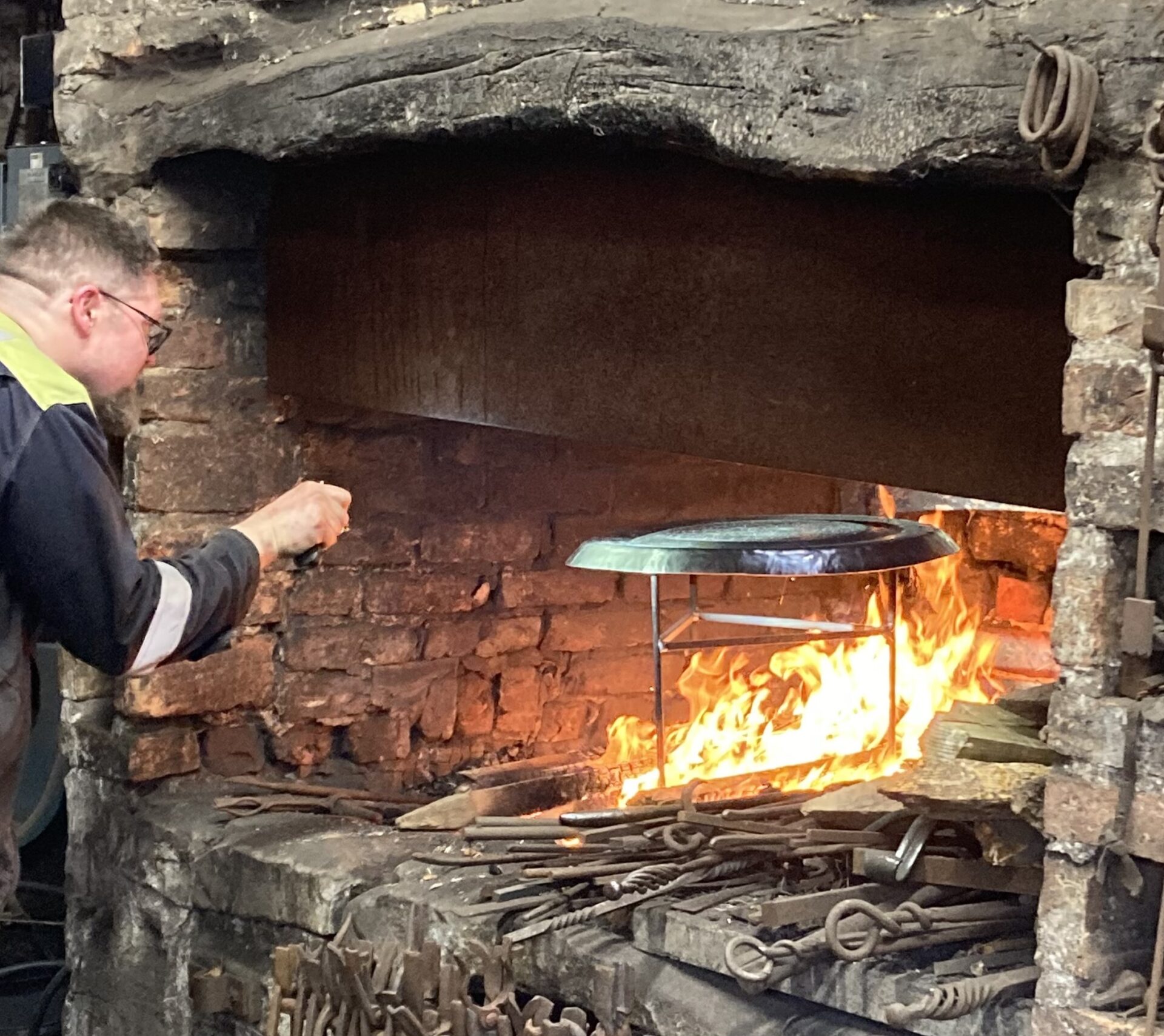 Man forging gong